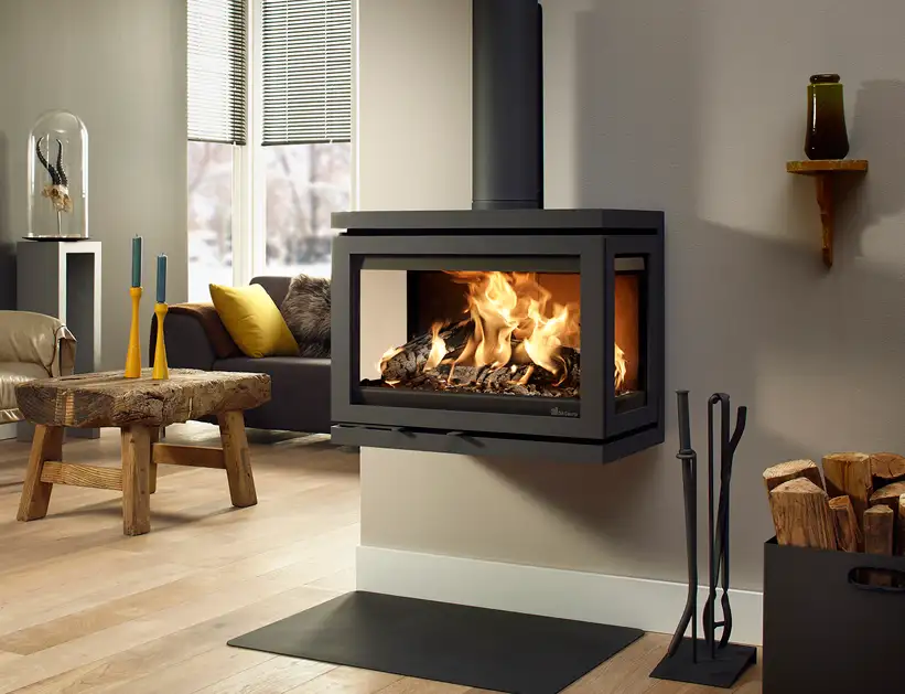 A large wood burning stove attached to a wall